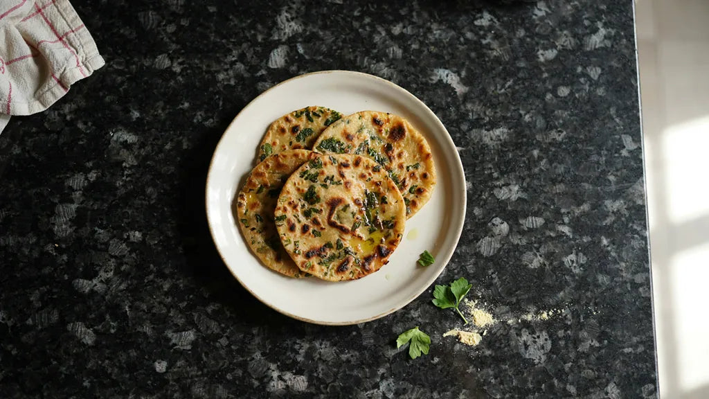 Methi parathas densely flecked with fenugreek leaves, made with CressPure Premium Sharbati Atta
